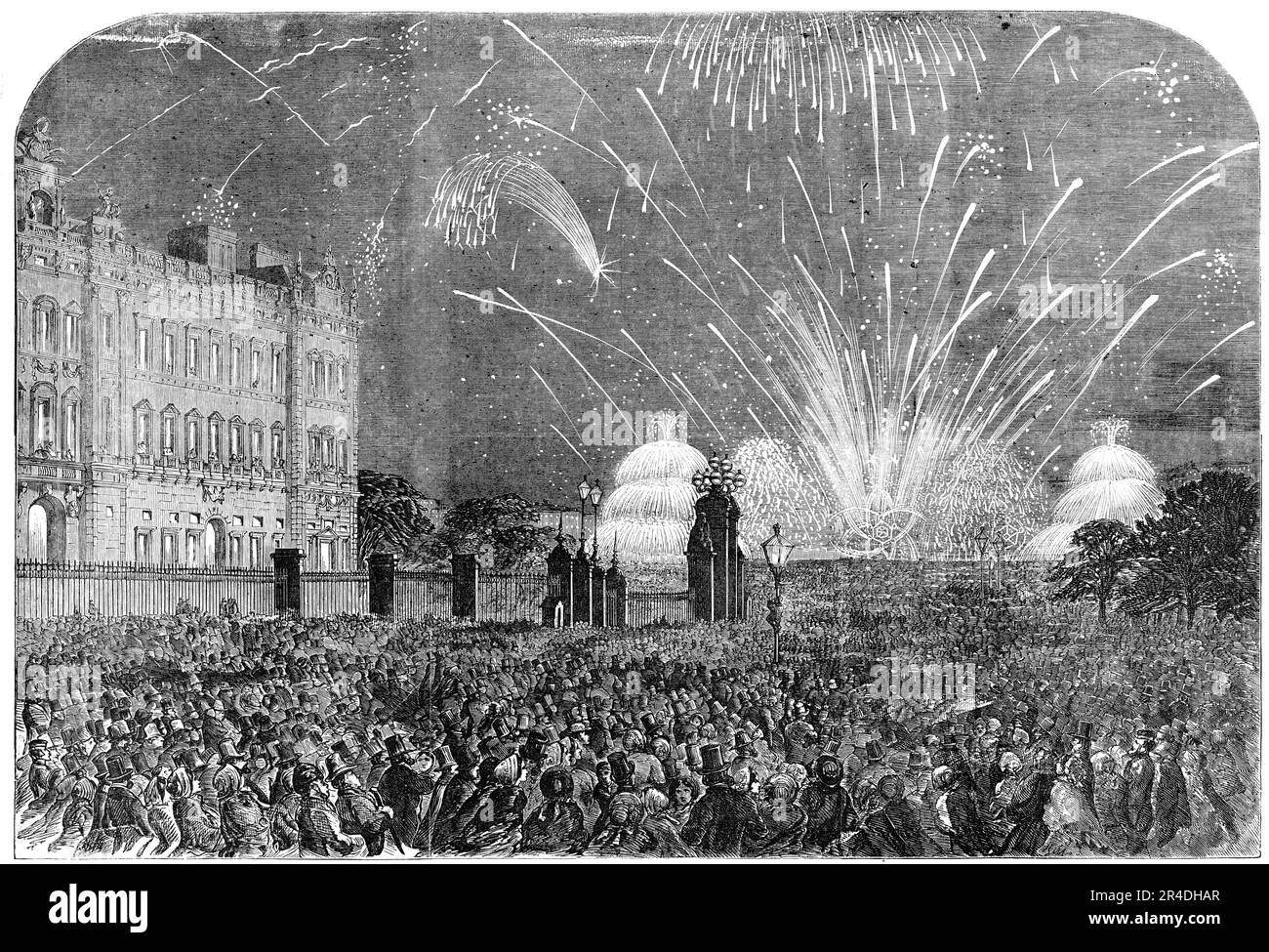 The Peace Commemoration: the Fireworks, sketched from the Mall, in St. James's Park, 1856. Londoners celebrate the end of the Crimean War. '...the effect was something like that which would be produced by a chemical manufactory in flames...the air above the park and for some distance around was luminous with the blaze of suns, stars, comets, and streamers - the flight of rockets, shells, and Roman candles - the descent of meteors, parachutes, and showers of pearl, silver, and golden rain. Shining serpents and fireflies chased each other through a sea of light, resting on a bed of upturned huma Stock Photo