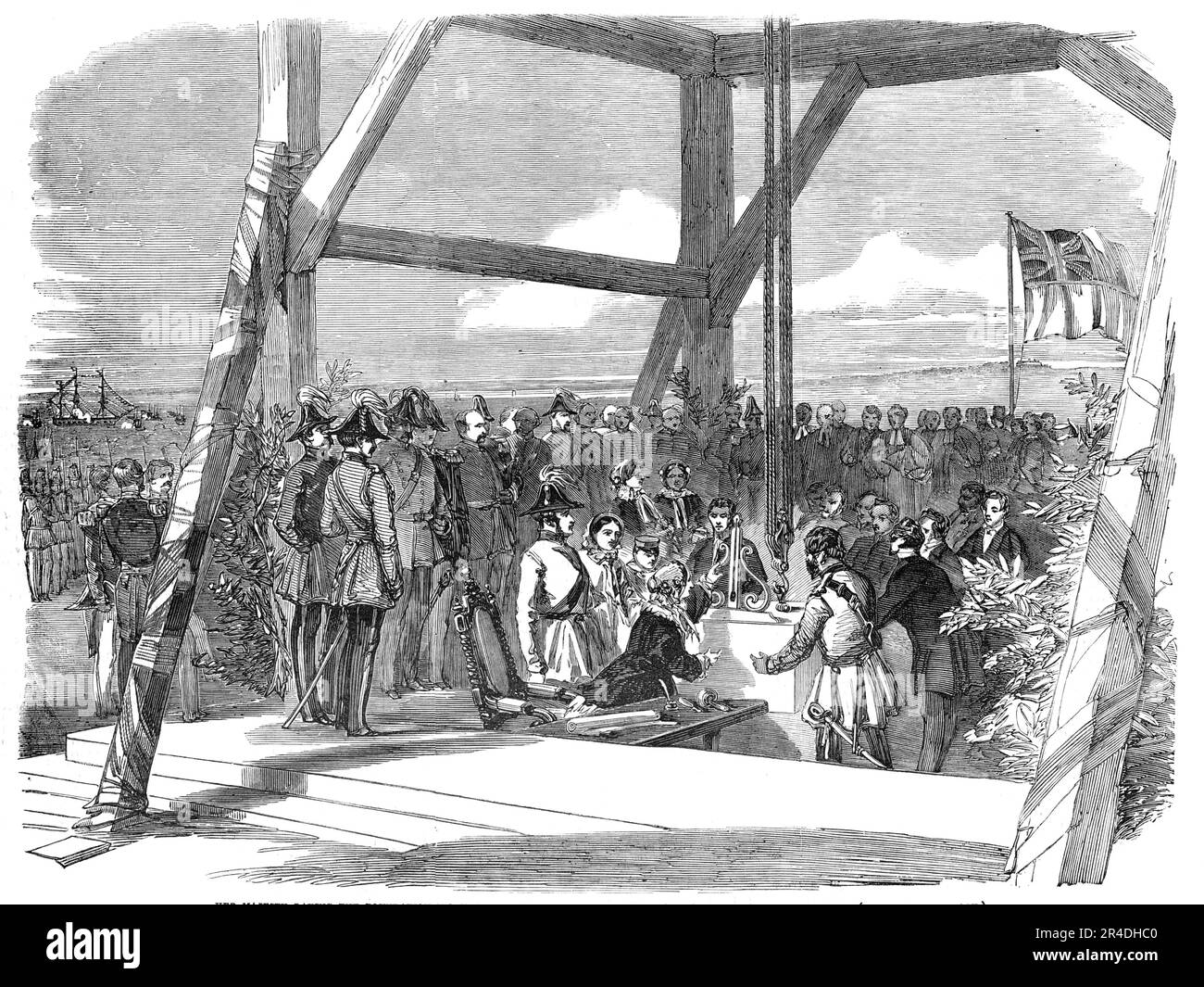 Her Majesty laying the Foundation-Stone of the New Military Hospital at Hamble, near Southampton, 1856. Ceremony at the Royal Victoria Hospital: '...the commanding Engineer presented to her Majesty [Queen Victoria] the plans of the building. Her Majesty having signified her approval of them, they were placed in the copper box prepared for the purpose, together with the coins, medals, and cross, and the vellum document recording the event. The Queen tried the stone with the plummet and level, and tapped it in the usual form, taking counsel with Lord Panmure as to the correct and truly masonic m Stock Photo