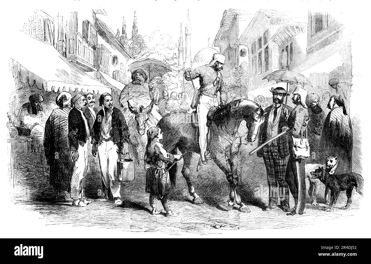 A Street at Constantinople, 1856. Crimean War, Turkey: '...the European element to a greater extent prevails. The dandy amateur with Jim Crow hat, surrounded by a veil, is arm-in arm with the dandy British officer, who clangs his long spurs on the bad pavement...He has learned not to be annoyed at the vicinity of dogs - in Turkey they are mangy brutes - and to treat with great composure the request of dirty little picturesque boys to do innumerable things which we cannot comprehend...Under their awnings, meanwhile, sit some Turks - here, as in all places and situations - lazy, and squatting; w Stock Photo