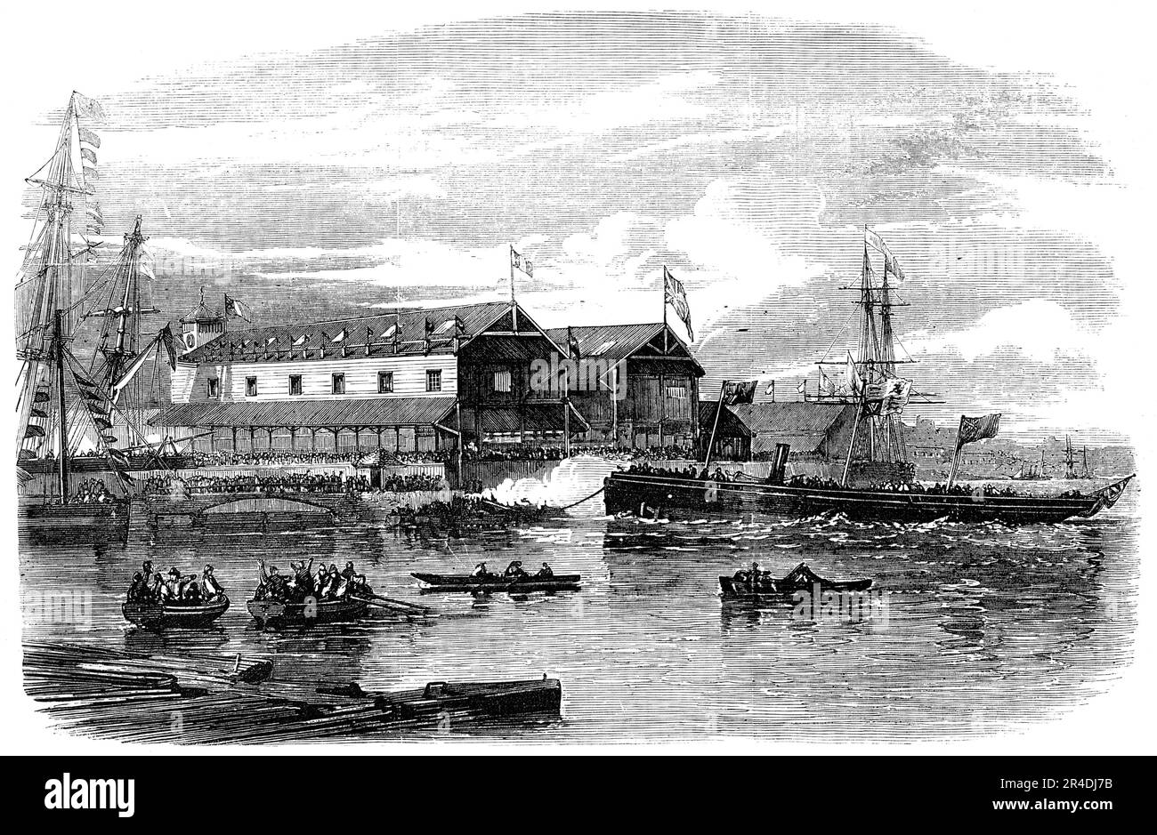 Launch of H.M. Gun-Boat &quot;The Hardy&quot;, at Bristol, 1856. 'This fine vessel was launched from the Albion Dockyard of Messrs Charles Hill and Sons...As the dockyard clock commenced striking four, a gun fired. Miss Stewart named the Hardy, the [blocks] were knocked away, the band struck up &quot;God Save the Queen,&quot; and the beautiful vessel glided majestically into the water, amid the shouts of the vast multitude...The following are the dimensions of the vessel: Length, 106 feet; breadth, 22 feet; depth, 8 feet; tonnage, 233; draught of water 6 ft. 6 in. Her engines are by Messrs. Ma Stock Photo