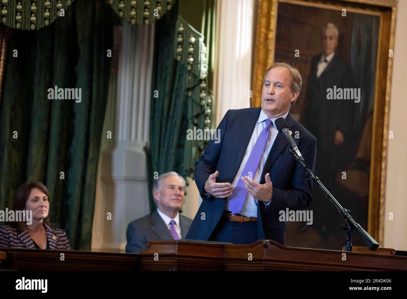 Texas Attorney General KEN PAXTON speaks after he is sworn into office by Texas Governor GREG ABBOTT on January 10, 2023.  Paxton is facing an impeachment vote in the Texas House after a long running ethics dispute.  Watching at left is Paxton's wife Angela, a state senator. Stock Photo