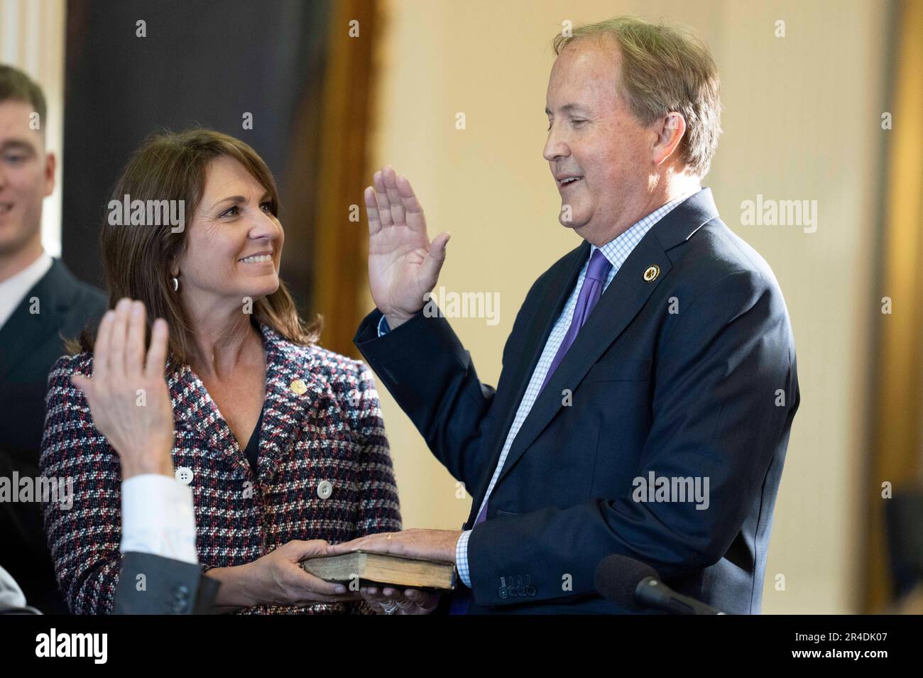 Texas Attorney General KEN PAXTON is sworn into office as wife ANGELA PAXTON watches on January 10, 2023.  Paxton is facing an impeachment vote in the Texas House after a long running ethics dispute. Stock Photo
