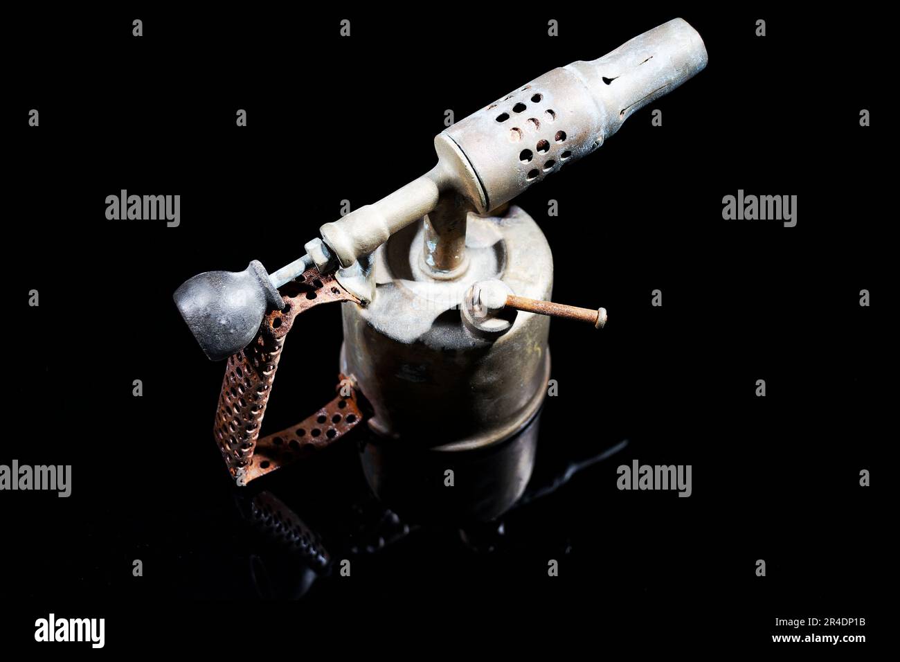 old and vintage blow torch isolated on black background with rust and corrosion Stock Photo Alamy