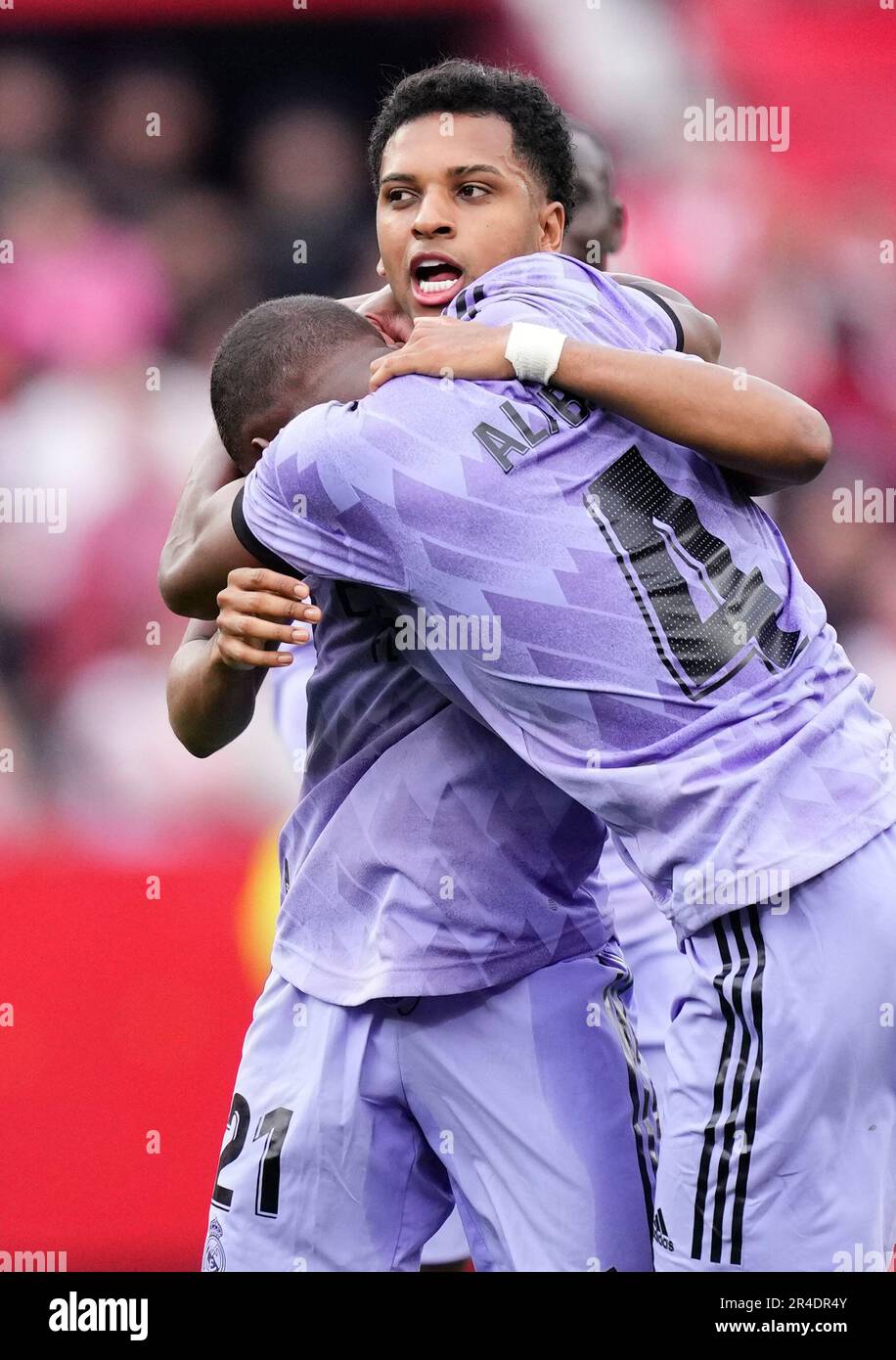 Real Madrid's Rodrygo, top, celebrates with David Alaba after scoring his  side's first goal during a Spanish La Liga soccer match between Sevilla and Real  Madrid at the Ramon Sanchez Pizjuan stadium