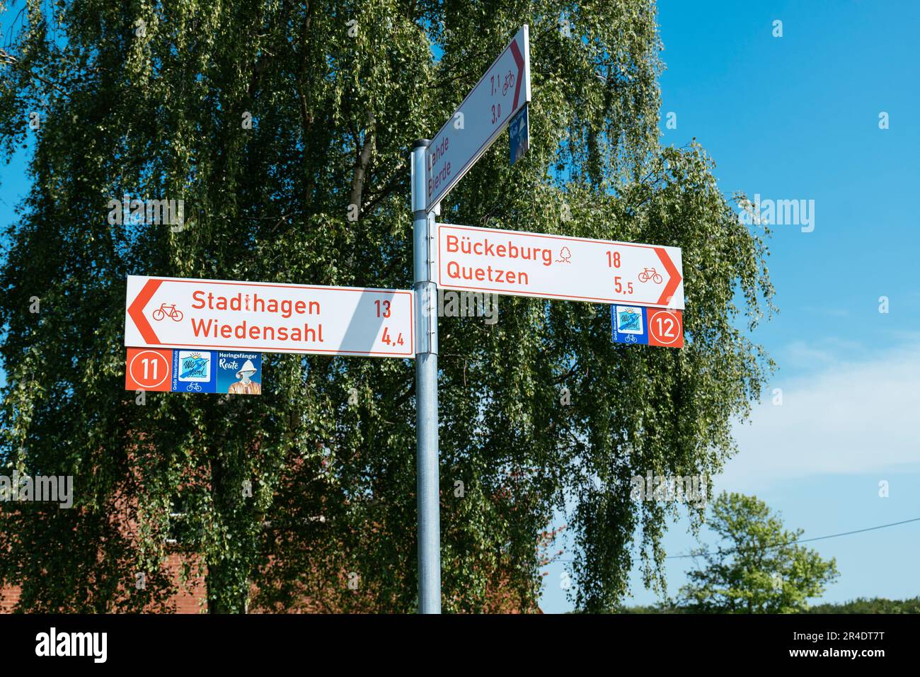 Road sign in Petershagen for bicycle routes Stock Photo