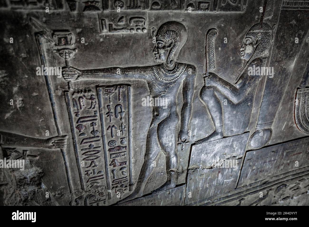 Wall carving in the crypt of the Temple of Hathor, Dendera, showing the ...