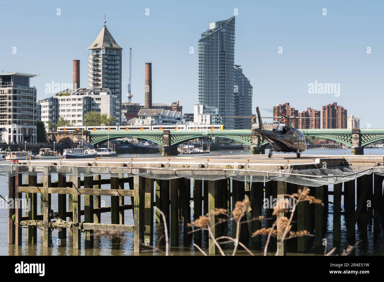 A helicopter landing at London Heliport, Lombard Road, Battersea