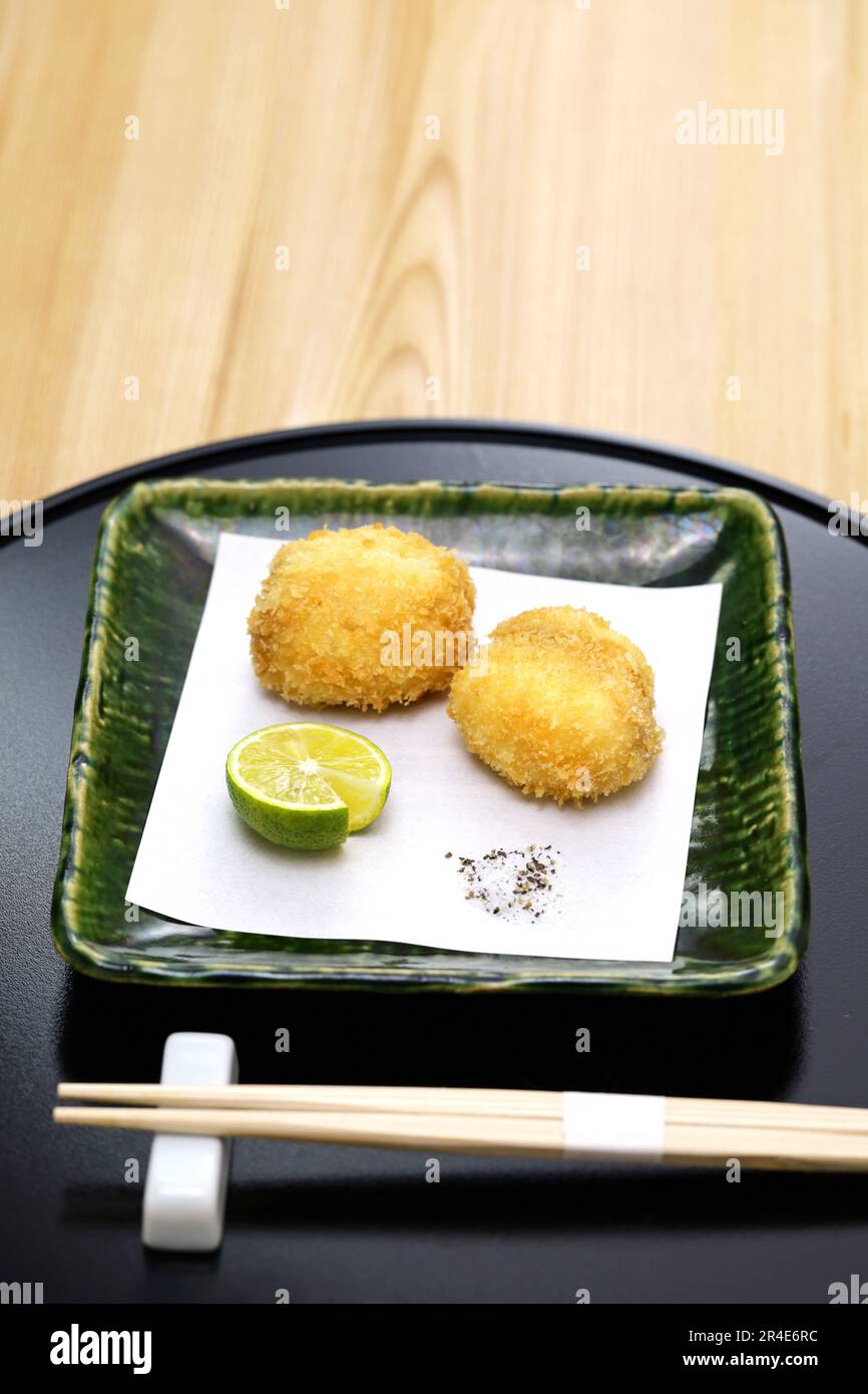 fried puffer fish milt, traditional Japanese cuisine Stock Photo Alamy