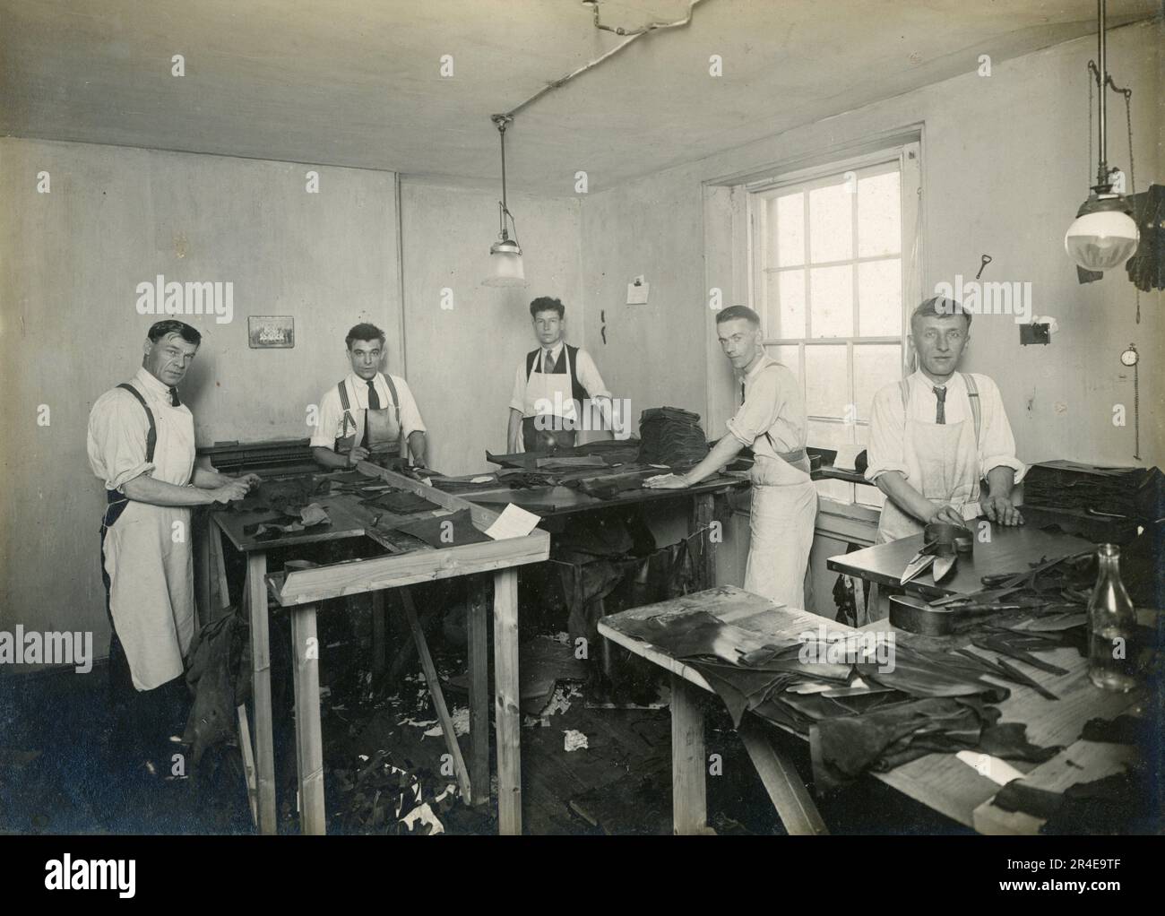 Glove Manufacture in 1930s. A small glove manufacturer operating in the 1930s with a small workforce. Stock Photo