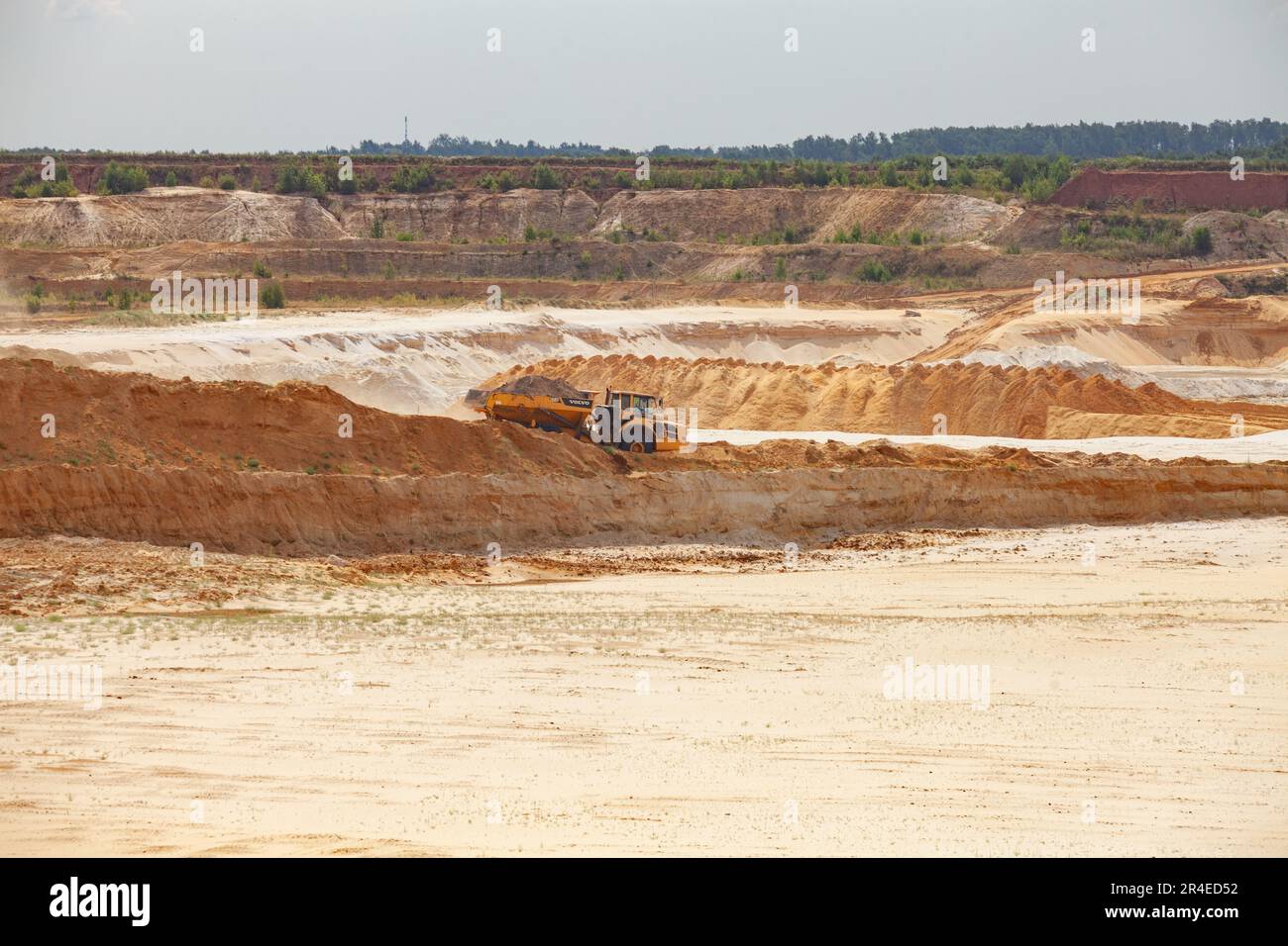 Chulkovo, Moscow province - July 20, 2021: Quarry truck Volvo move ground. Open-pit white sand extraction Stock Photo