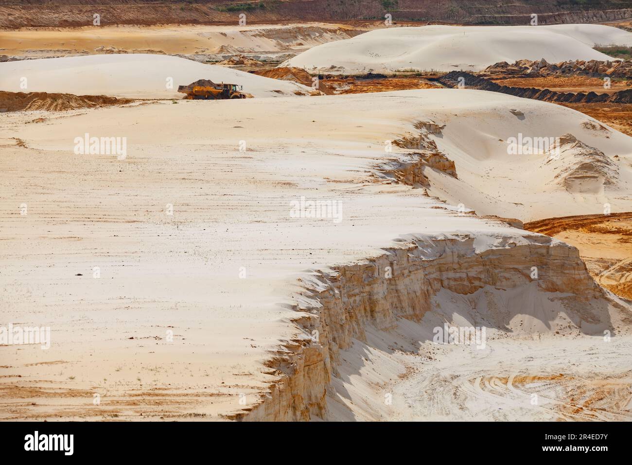 Chulkovo, Moscow province - July 20, 2021: Quarry truck Volvo move ground in sands. Open-pit sand extraction Stock Photo