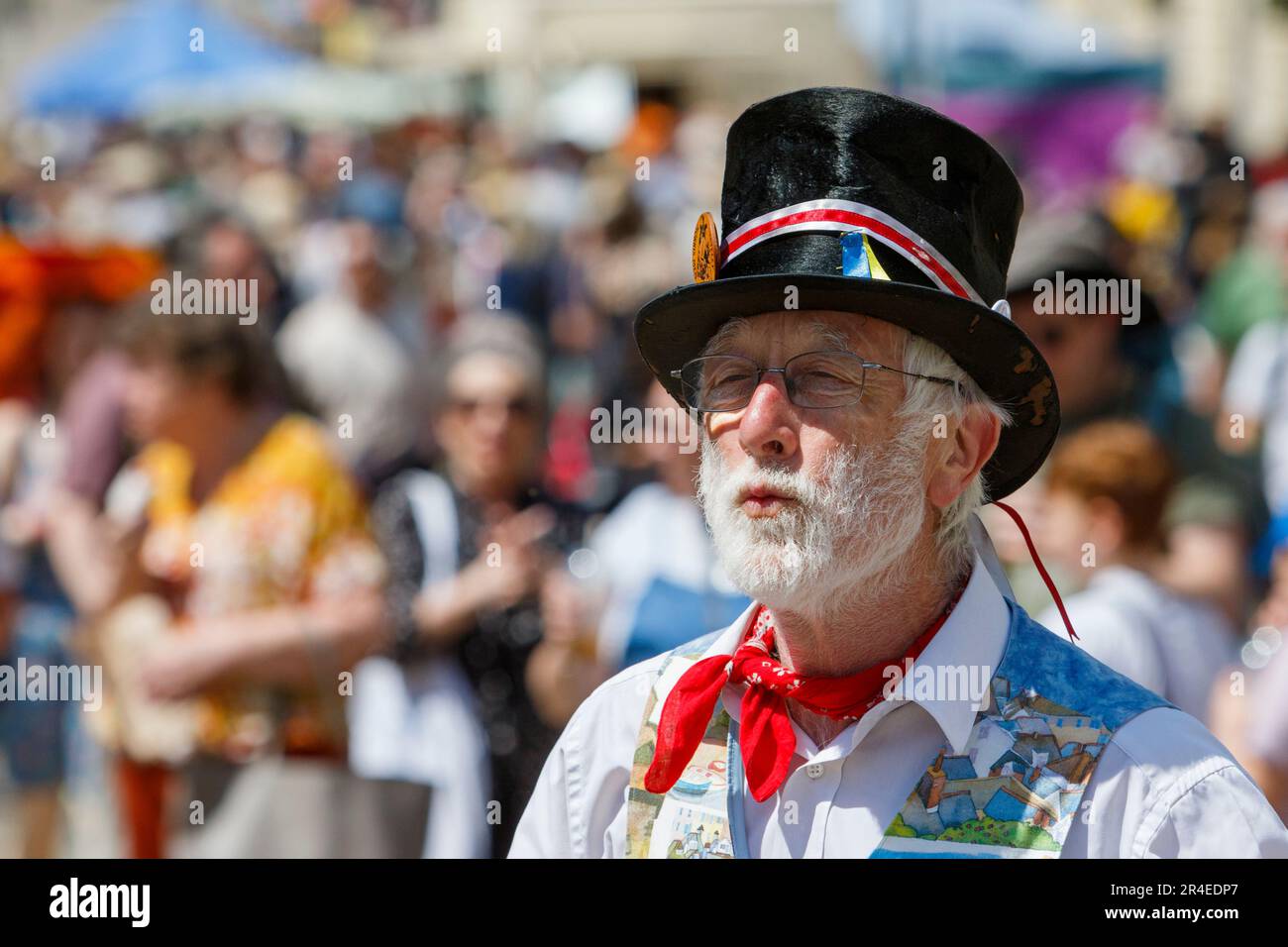 Chippenham, UK, 27th May, 2023. A Morris dancer from the Tinners Morris from South Zeal, Devon is pictured as he pulls a funny face during a performance at the  opening day of the 2023 Chippenham folk festival. The 2023 festival is the festivals 50th Anniversary. Credit: Lynchpics/Alamy Live News Stock Photo
