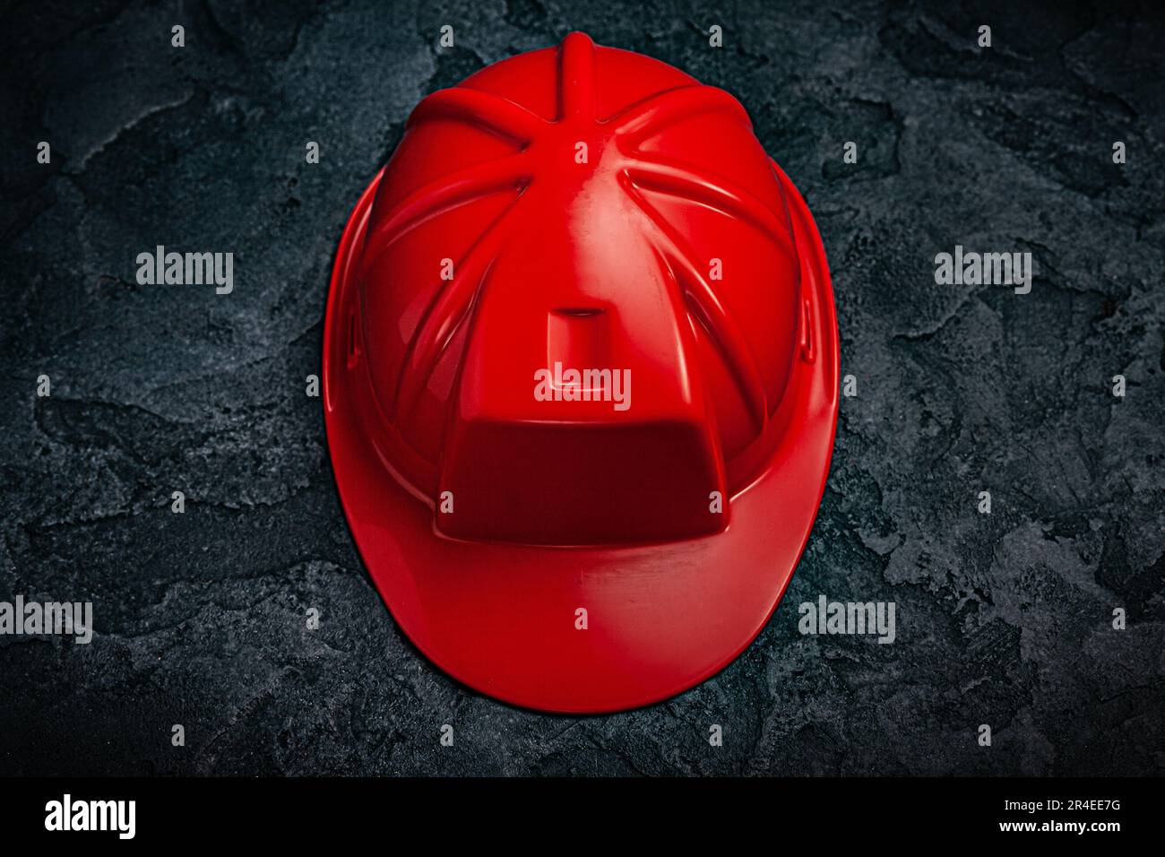 Red Construction Helmet On Dark Stone Background Stock Photo Alamy