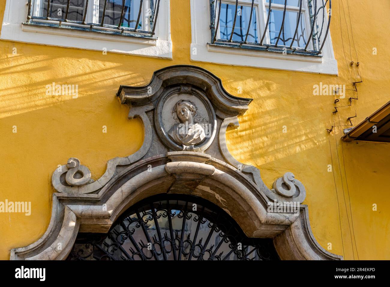 Detail above the entrance portal at Getreidegasse 9, Mozart's