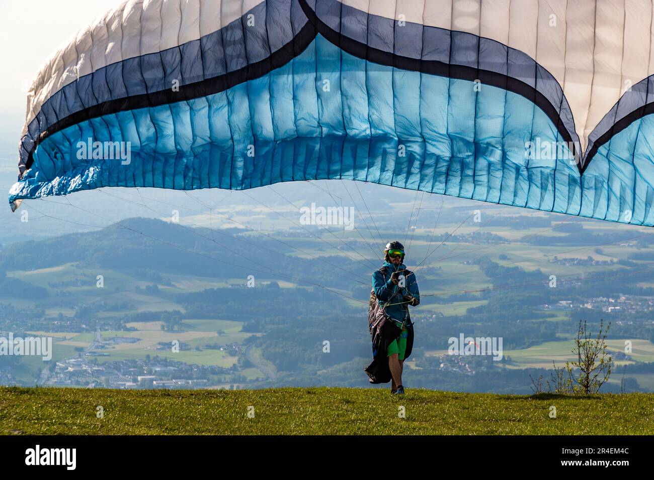Paraglider taking off on the Goasnalm high above Salzburg, Austria Stock Photo