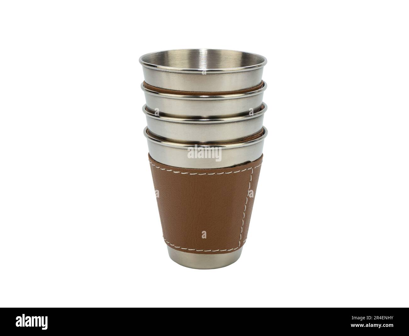 Stainless cups fitted inside each other, isolated on the white background. Indispensable attribute of the picnic or camping Stock Photo