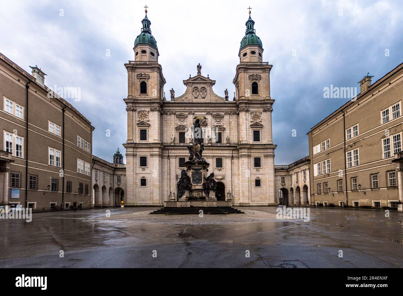 The early Baroque cathedral of Salzburg, surrounded by three squares, formed the center of the spiritual life of the city. Here is the baptismal font in which Mozart was baptized the day after his birth. Salzburg, Austria Stock Photo