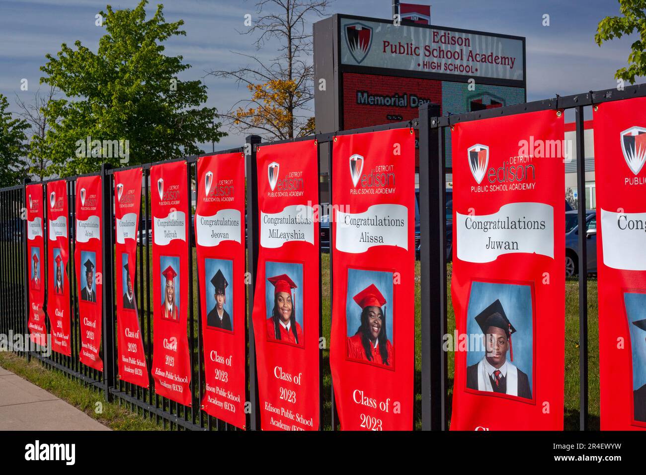 Detroit, Michigan, USA. 27th May, 2023. Detroit Edison Public School Academy posts photos of its high school graduates on the fence outside the school. The school is a charter school operated by New Paradigm for Education (NPFE). It serves mostly African-American and Latino students. Credit: Jim West/Alamy Live News Stock Photo