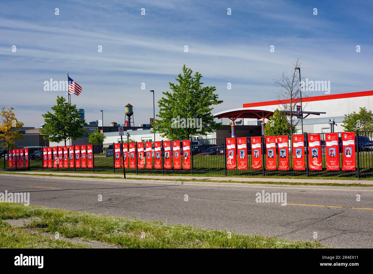 Detroit, Michigan, USA. 27th May, 2023. Detroit Edison Public School Academy posts photos of its high school graduates on the fence outside the school. The school is a charter school operated by New Paradigm for Education (NPFE). It serves mostly African-American and Latino students. Credit: Jim West/Alamy Live News Stock Photo