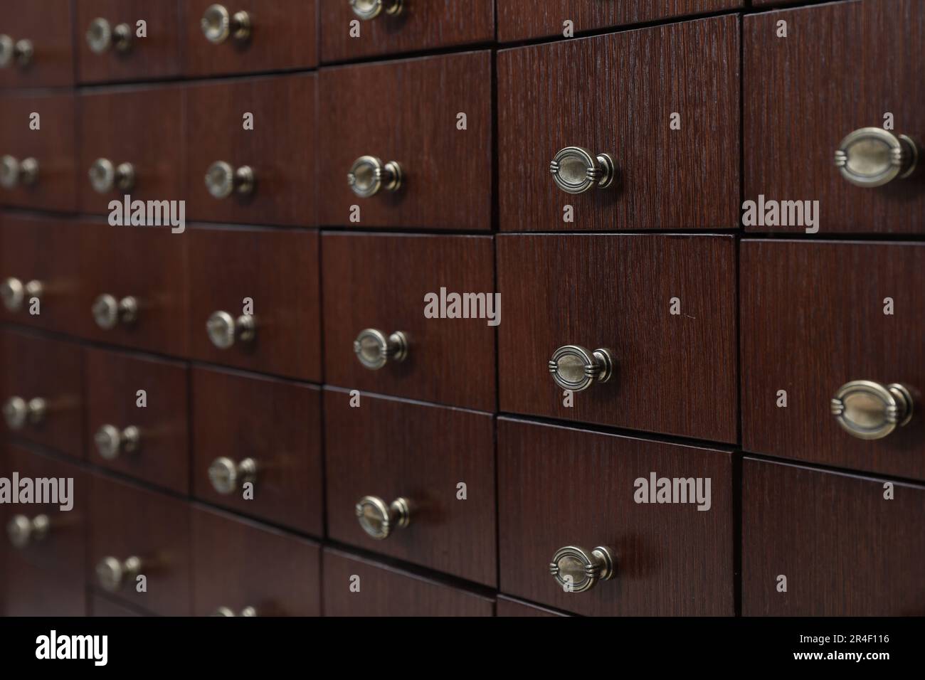 Library catalog. Wooden chest of drawers, closeup Stock Photo Alamy