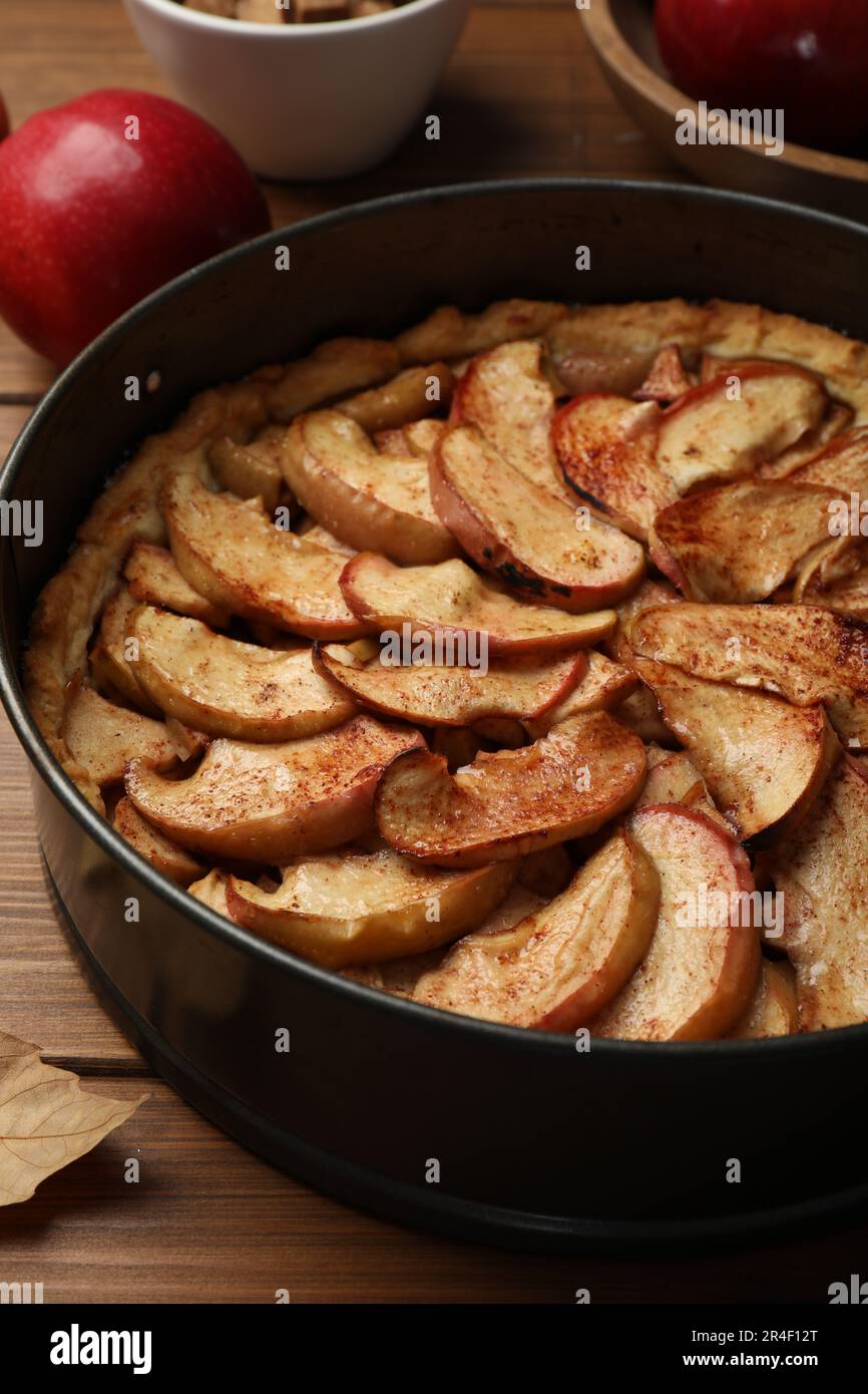 Delicious apple pie on wooden table, closeup Stock Photo