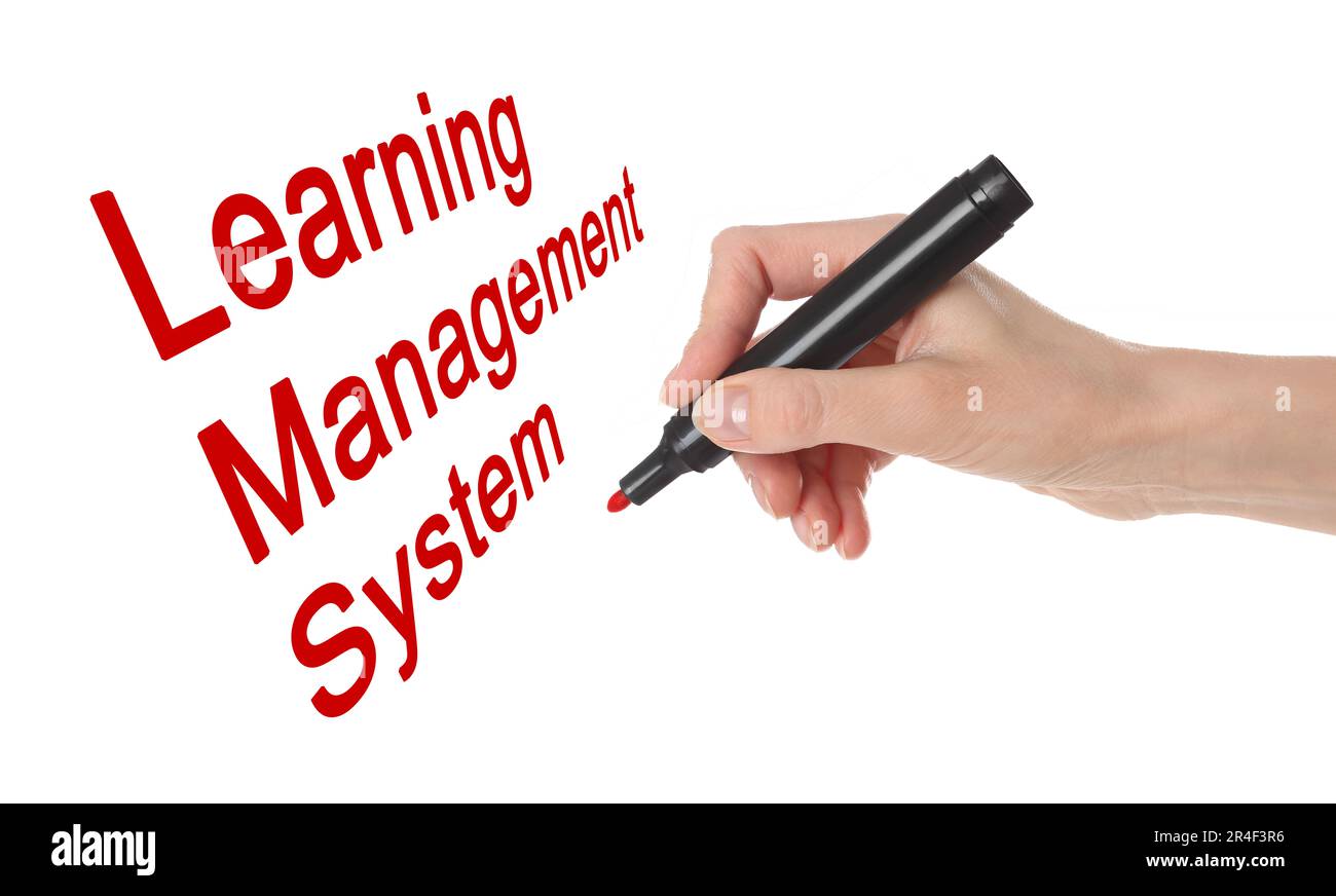 Woman writing Learning Management System on white board, closeup Stock Photo