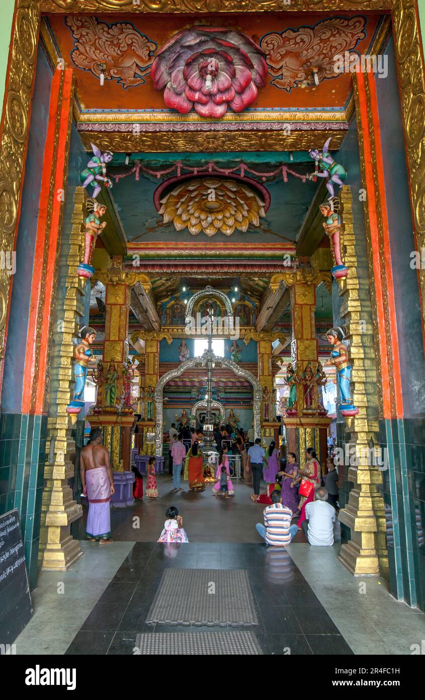 The view looking from the entrance doorway into Sri Muthumariamman Thevasthanam Hindu Temple at Matale in Sri Lanka. Stock Photo