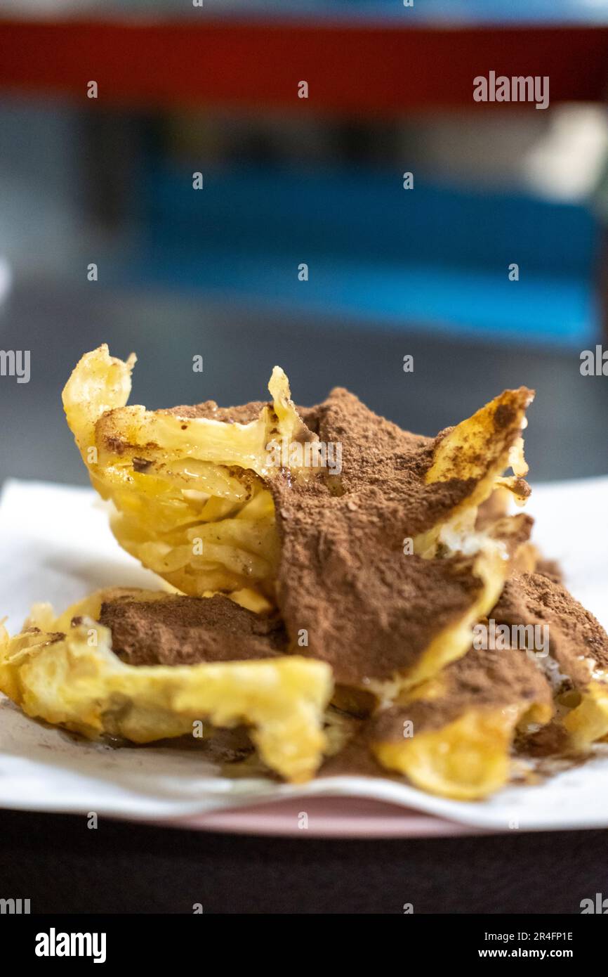 Chocolate Roti Crispy Roti with chocolate powder, served on plate Stock Photo - Alamy