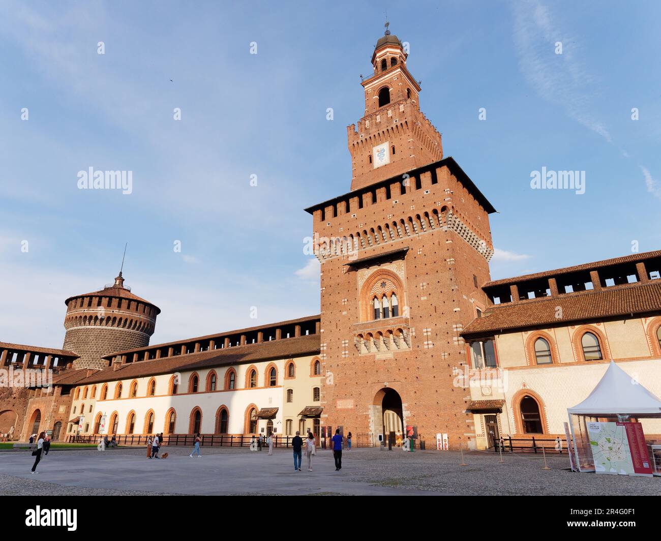 Sforzesco Castle and courtyard with tourists sightseeing in the City of Milan, Lombardy, Italy Stock Photo