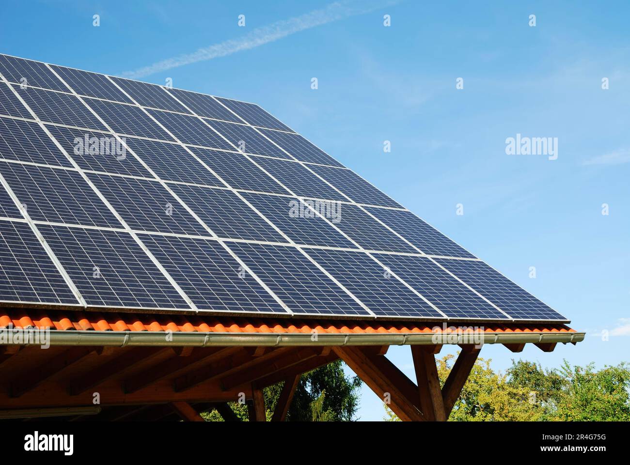 Green renewable energy with photovoltaic installations on the roof ...
