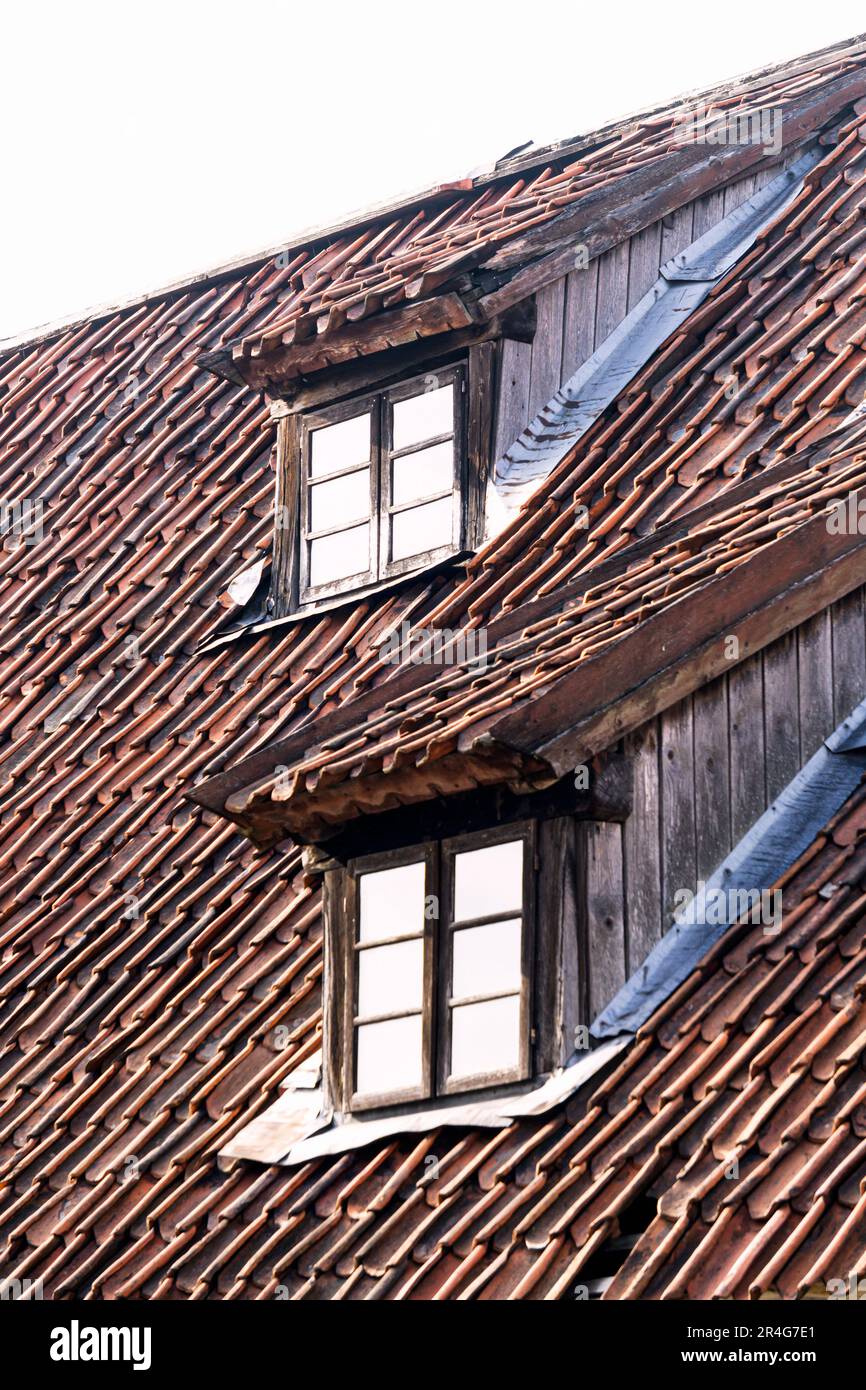 Window 1848 The windows of the historic building of the 18th century on the roof ...
