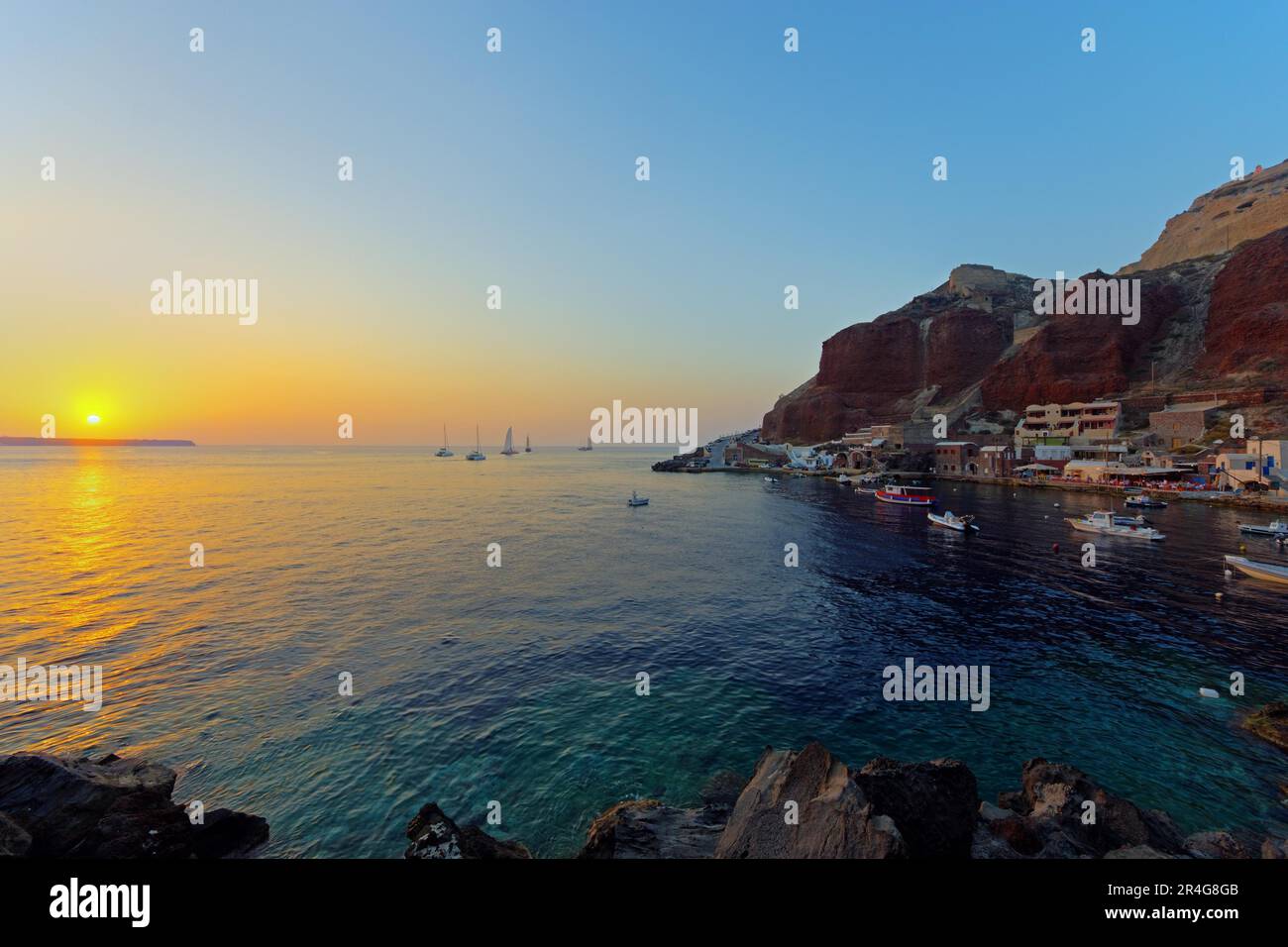 Ammoudi on Santorini at sunset Stock Photo