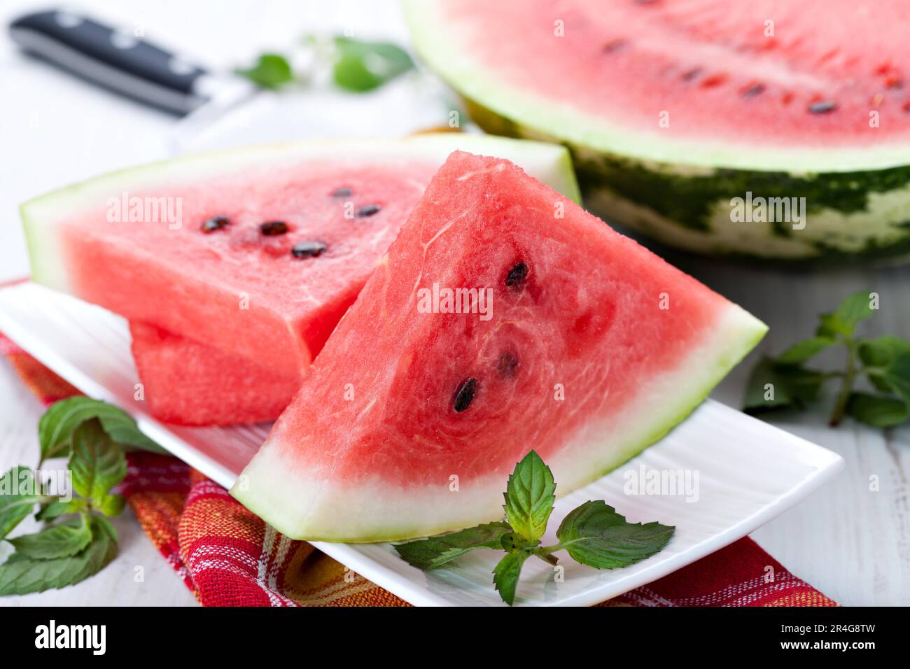 fresh watermelon slices on a white background Stock Photo - Alamy