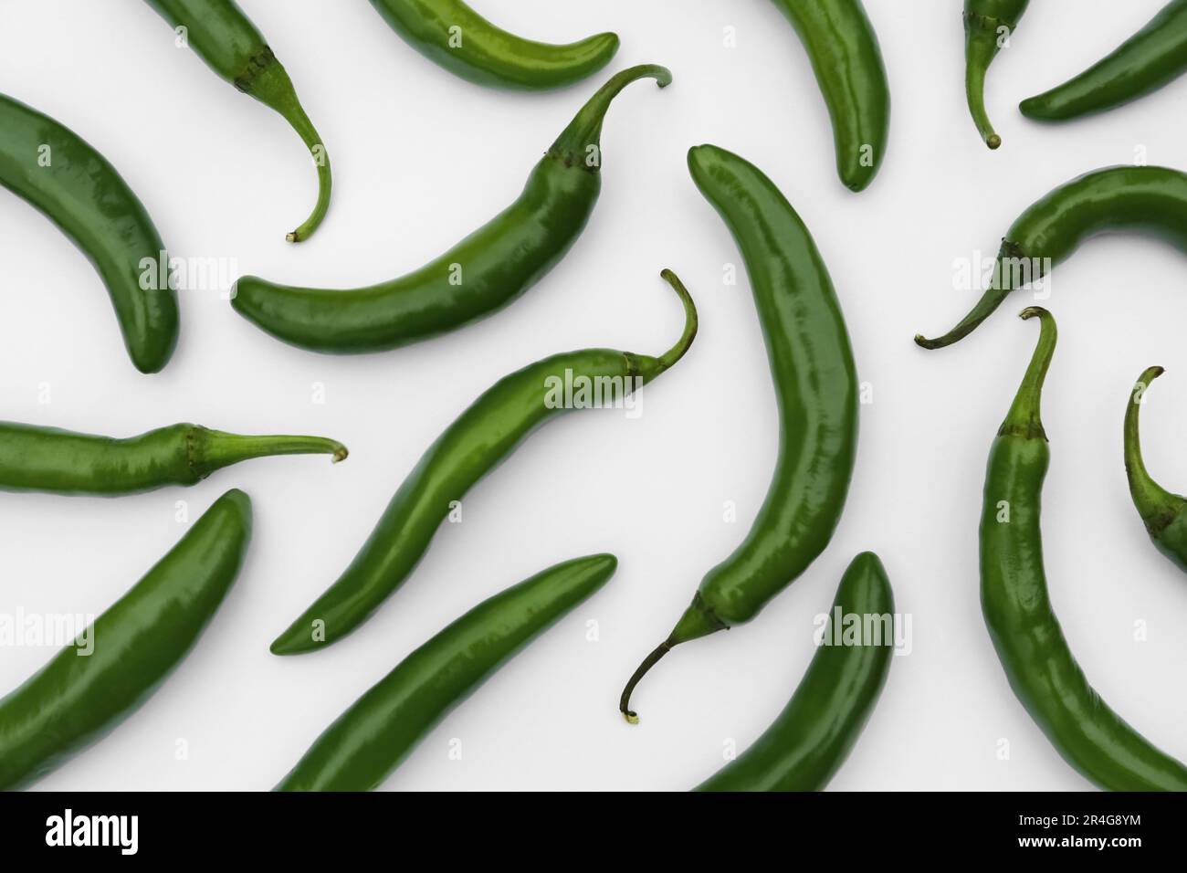 Many green hot chili peppers on white background, flat lay Stock Photo ...