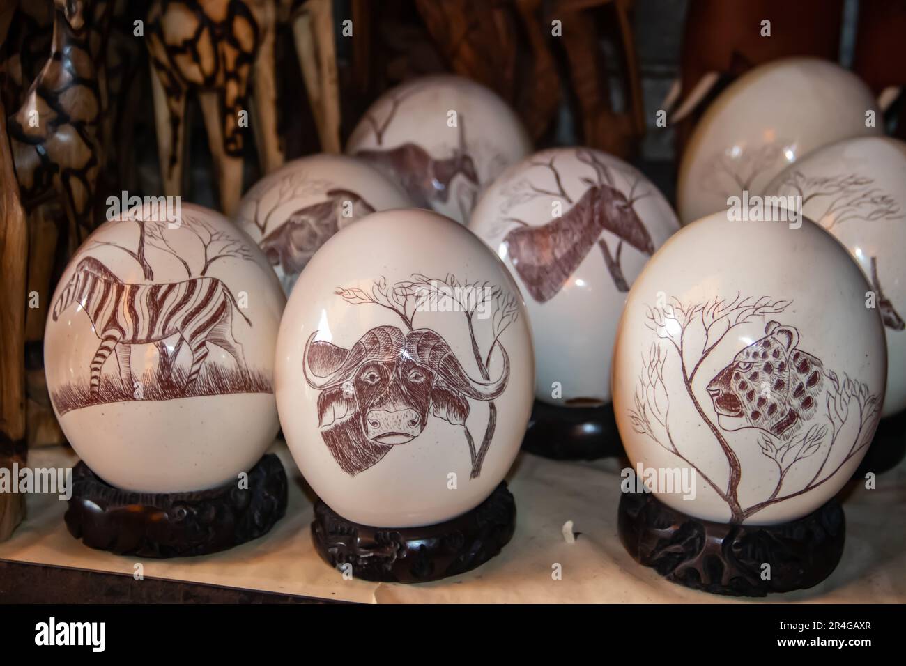 Ostridge's eggs with artistic decorative drawing of African motives exposed in local open market