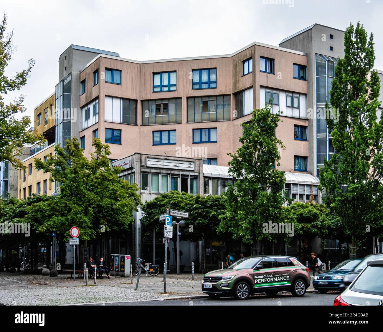 Street view, apartment building, cnr. Hermannstrasse & Briesestrasse, Neukölln, Berlin, Germany Stock Photo