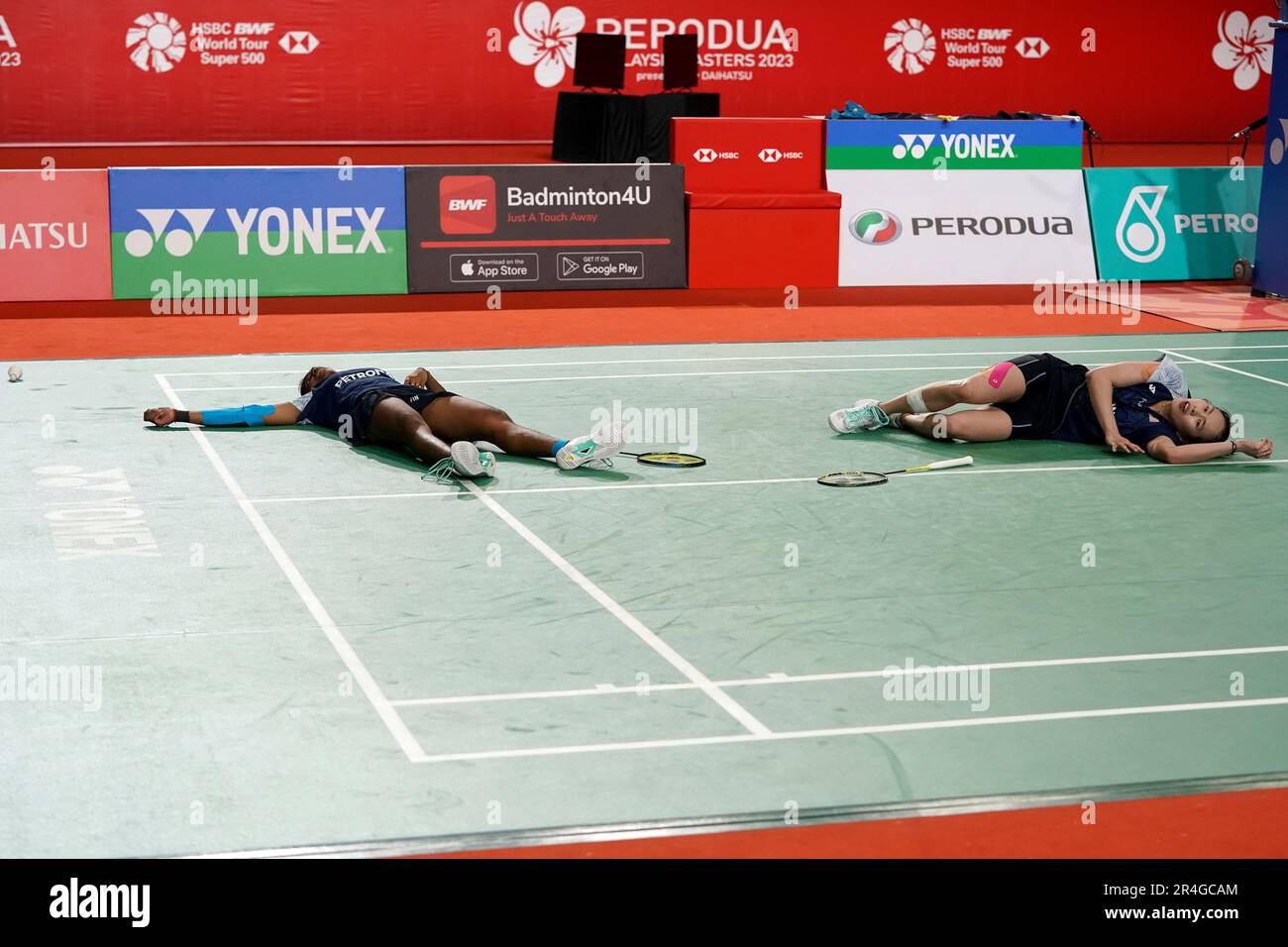Malaysia's Thinaah Muralitharan and Pearly Tan use three languages to communicate on the badminton court