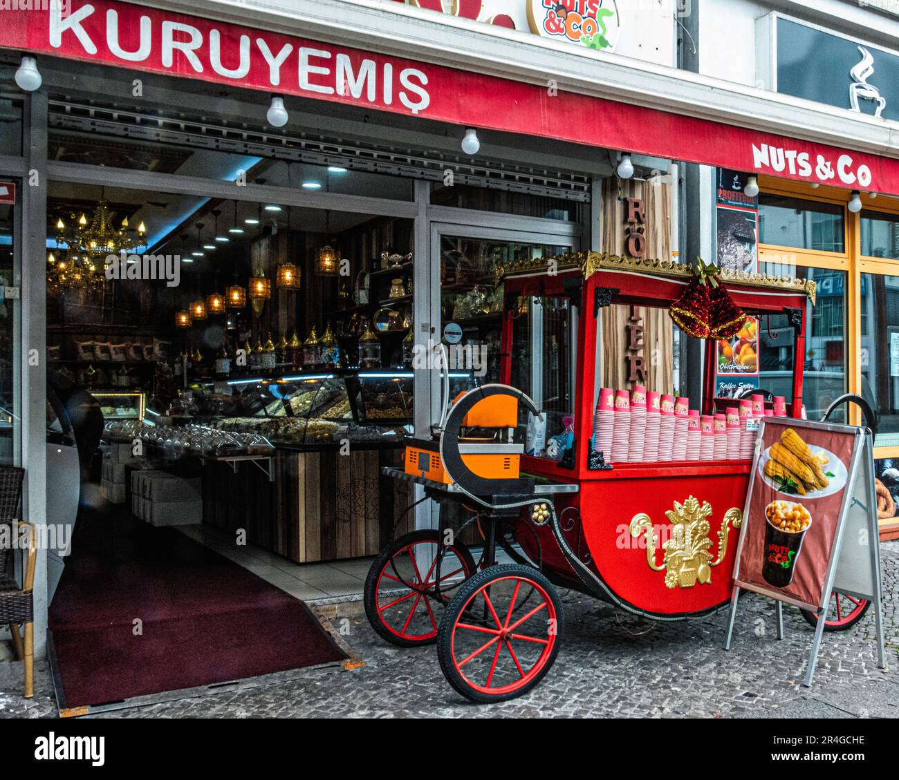 Nuts & Co, decorative wagon outside shop, Hermannstrasse 52 Neukölln, Berlin ,Germany Stock Photo