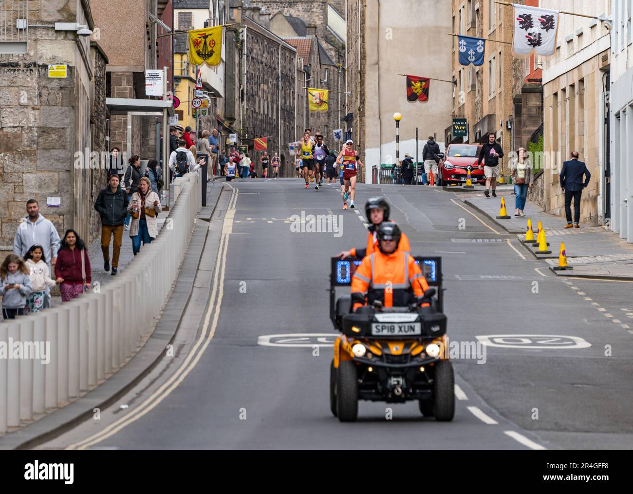 Edinburgh, Scotland, UK, 28th May 2023. Edinburgh Marathon: the lead runners (with Ollie Garrod in the lead) of thousands of marathon runners run down the Royal Mile in the early stage of the route. Credit: Sally Anderson/Alamy Live News Stock Photo