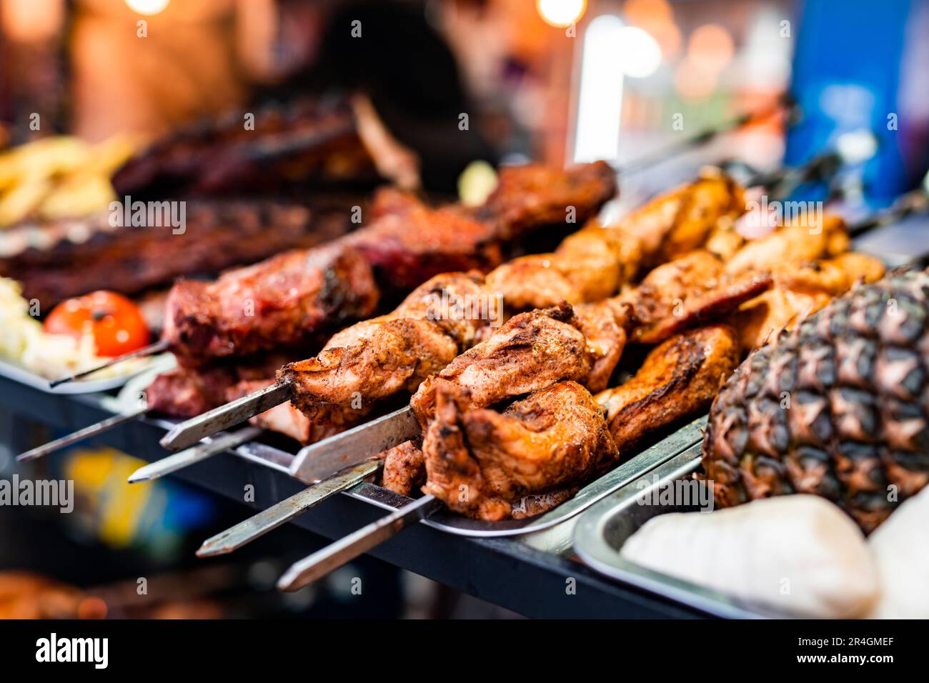 Barbecue grill meat at street food market. Fresh cooking delicious bbq beef at traditional fair Stock Photo Alamy