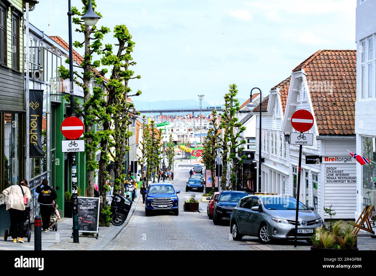 Stavanger, Rogaland, Norway, May 19 2023, Retail Shopping Street Downtown  Stavanger With Parked Cars And View Over The Harbour Stock Photo - Alamy