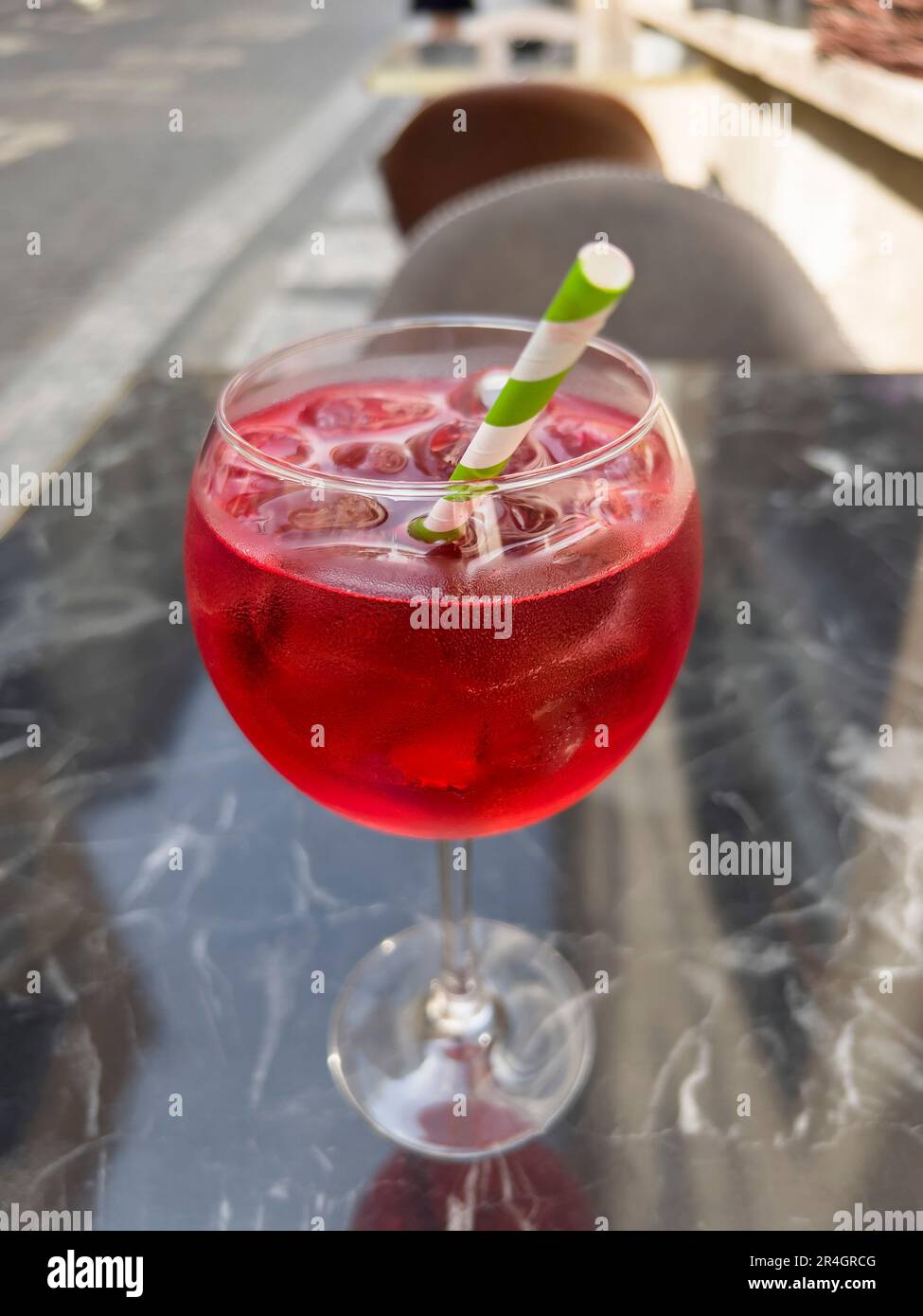 drink, closeup glass of martini fiero cocktail on marble table of open