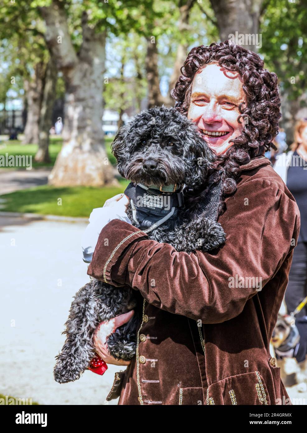london-uk-28th-may-2023-a-christopher-wren-lookalike-with-his-dog