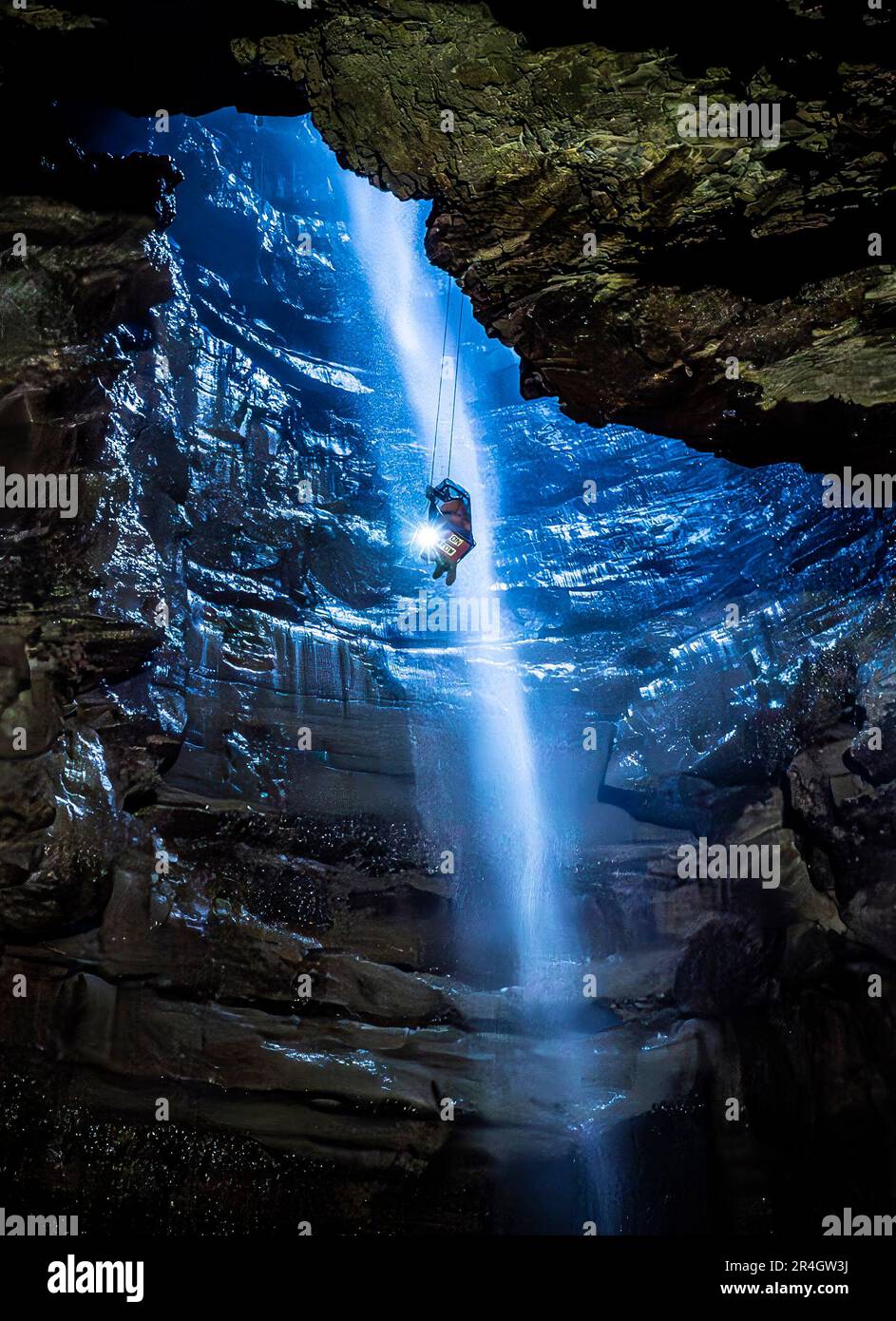 A potholer is winched into Gaping Gill, the largest cavern in Britain