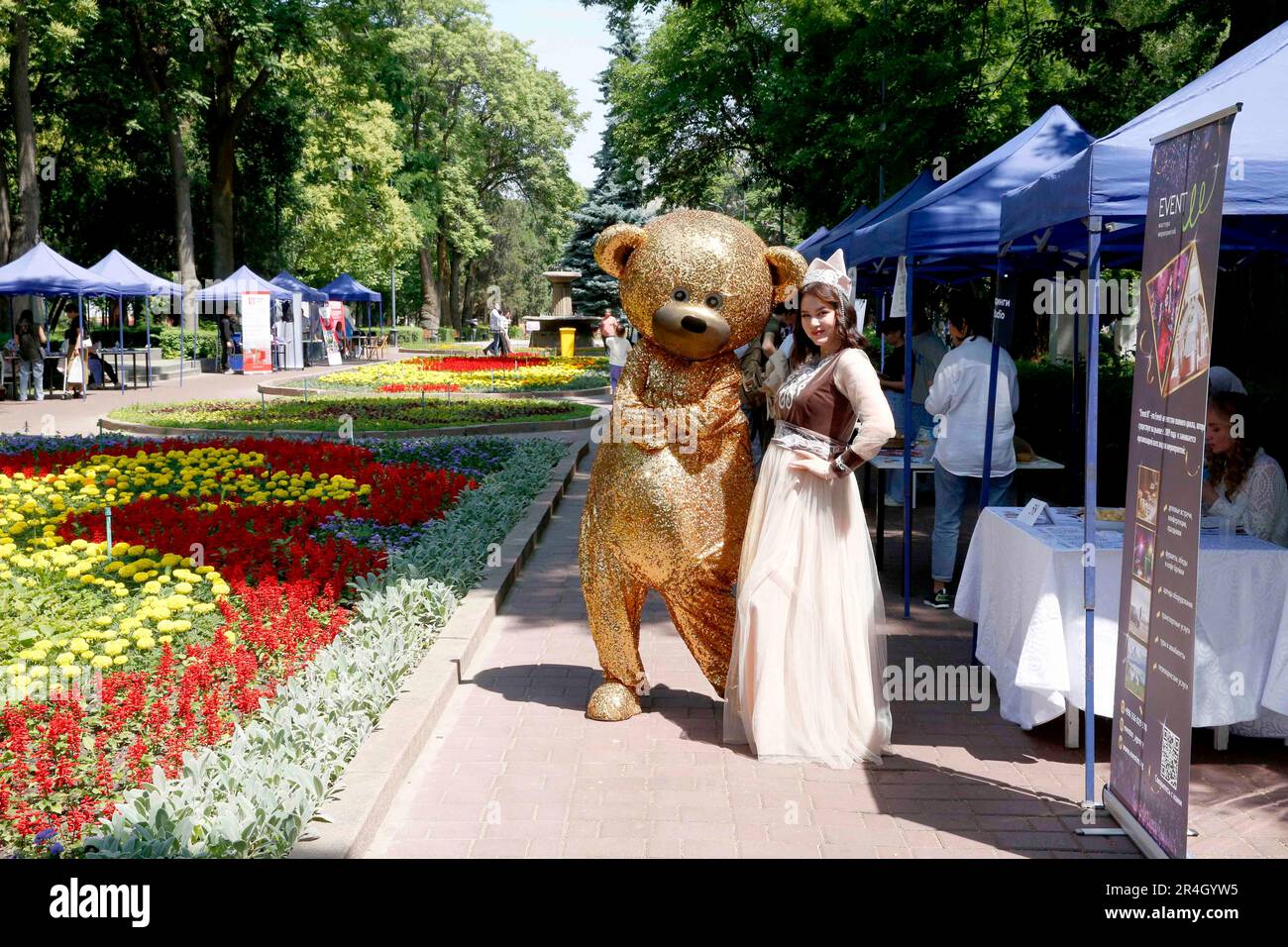 Bishkek. 27th May, 2023. This photo taken on May 27, 2023 shows staff members at a tourism festival in Bishkek, capital of Kyrgyzstan. Credit: Roman/Xinhua/Alamy Live News Stock Photo