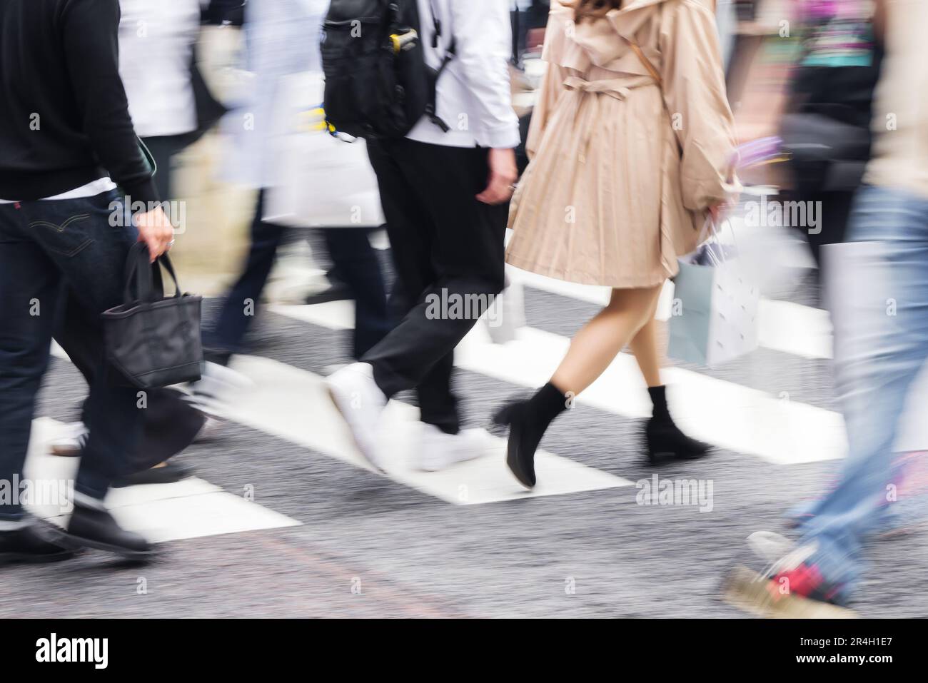 picture with camera made motion blur effect of a crowd of people ...