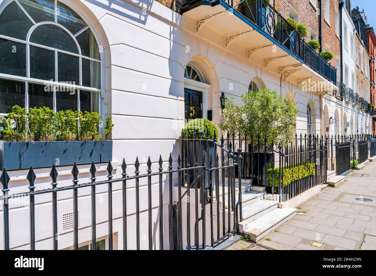 Elegant terraced houses in residential street of Belgravia, London, UK Stock Photo