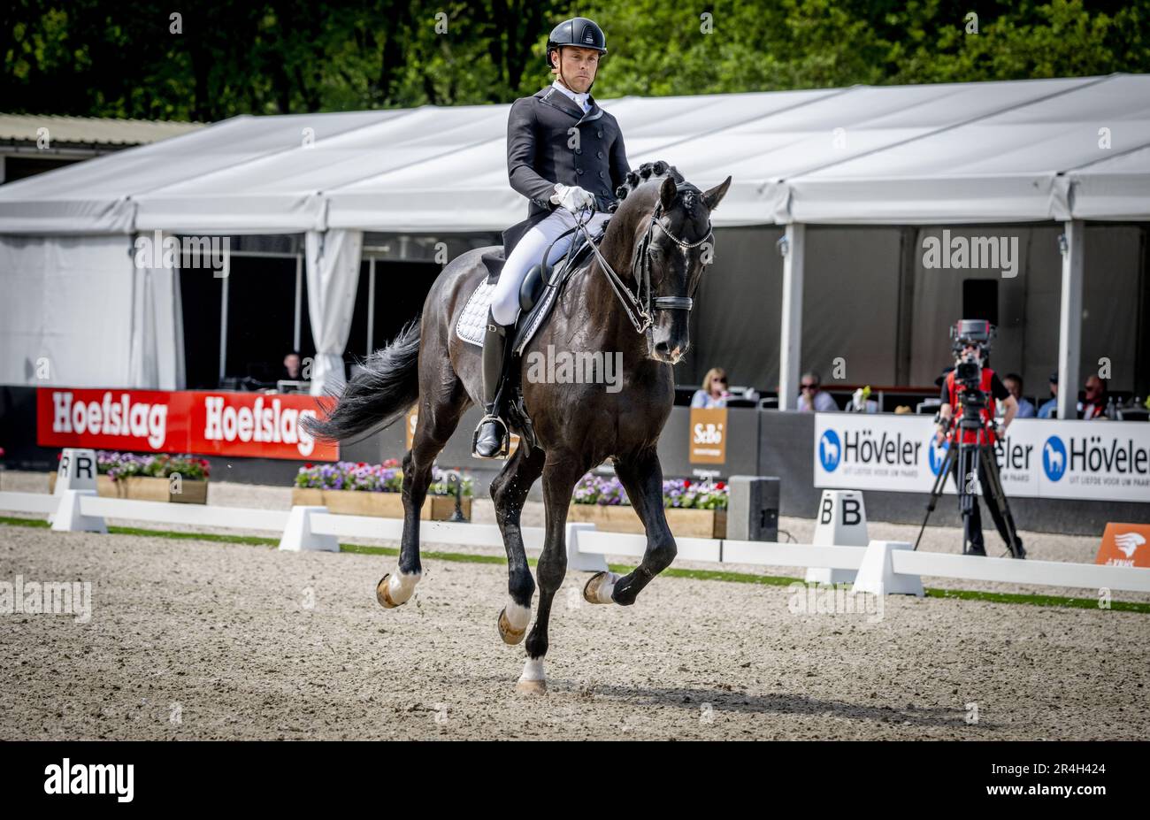 ERMELO - Laurens van Lieren with Dutch Design in action during the final of the Heavy Tour Freestyle at the NK Dressage. ANP ROBIN UTRECHT netherlands out - belgium out Stock Photo