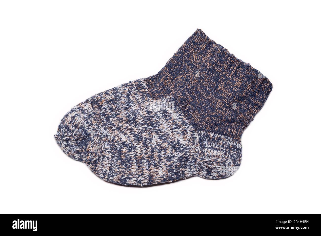 Knitted wool, handmade socks on a white background Stock Photo