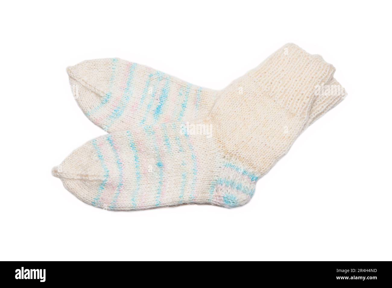 Knitted wool, handmade socks on a white background Stock Photo